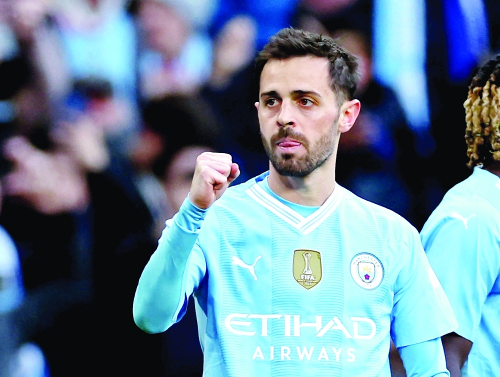 Manchester City's Bernardo Silva celebrates scoring their first goal -- Reuters