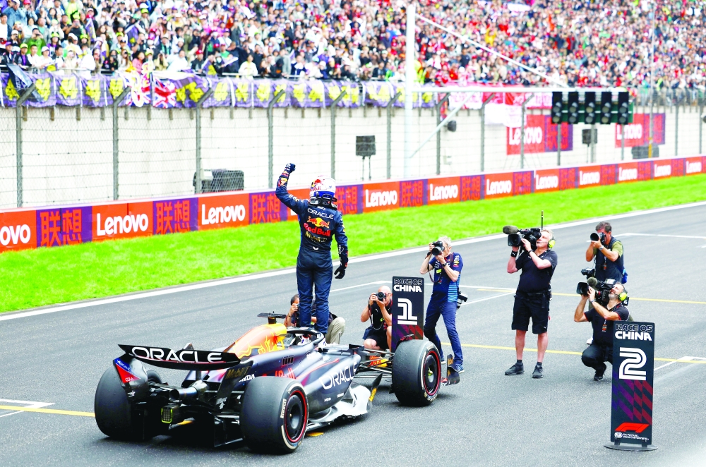 Formula One F1 - Chinese Grand Prix - Shanghai International Circuit, Shanghai, China - April 21, 2024 Red Bull's Max Verstappen celebrates after winning the Chinese Grand Prix. REUTERS