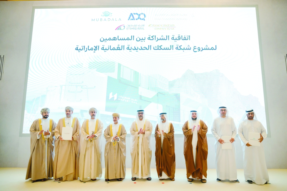 High-level officials from Oman and UAE at the signing of agreements linked to the implementation of the Oman – UAE rail project.