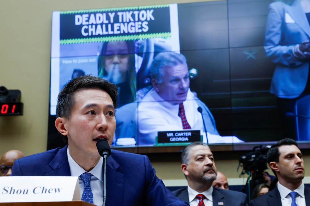 TikTok Chief Executive Shou Zi Chew testifies before a House Energy and Commerce Committee, in Washington—Reuters
