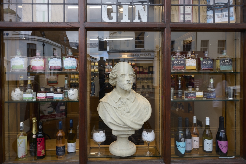 A Shakespeare bust in the window of a liquor store in Stratford-upon-Avon, England, in April 2024. (Andy Haslam/The New York Times)