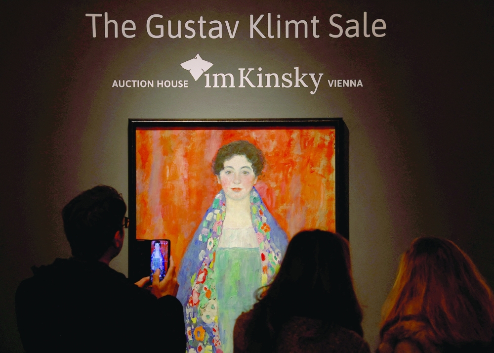 Visitors look at Austrian artist Gustav Klimt's portrait "Bildnis Fraulein Lieser", last seen in public in 1925 and estimated at $54 million, as it's in display ahead of an auction next week in Vienna, Austria April 19, 2024. 