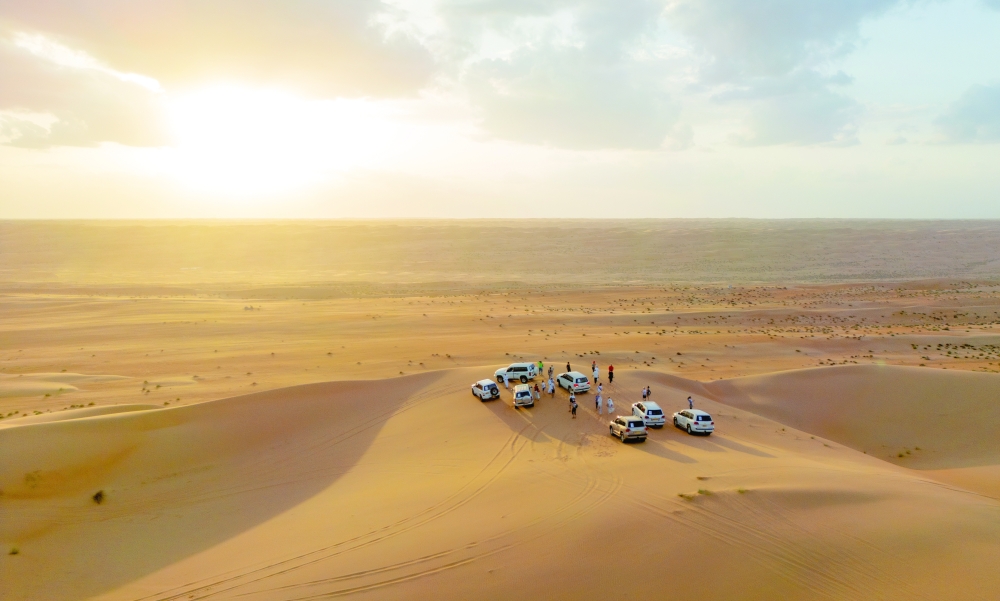 Tourists flock to golden sand dunes