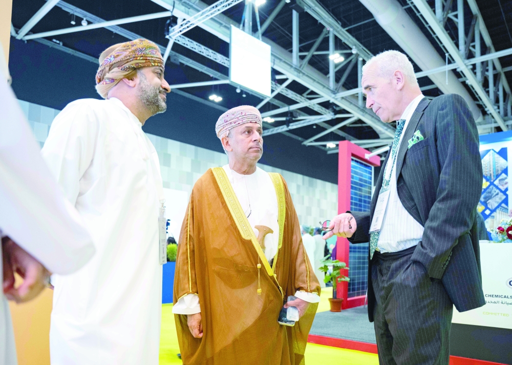 Eng Abdullah al Hashimi, Managing Director of Marafiq (centre), at Marafiq’s booth at Oman Sustainability Week.