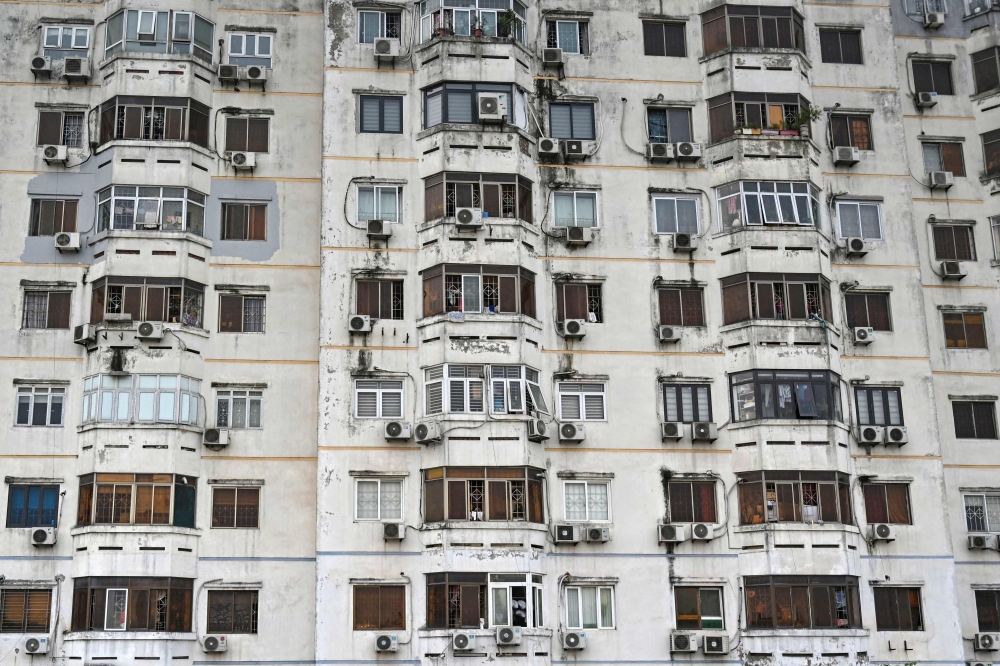 Air conditioning units outside an apartment building in Hanoi 