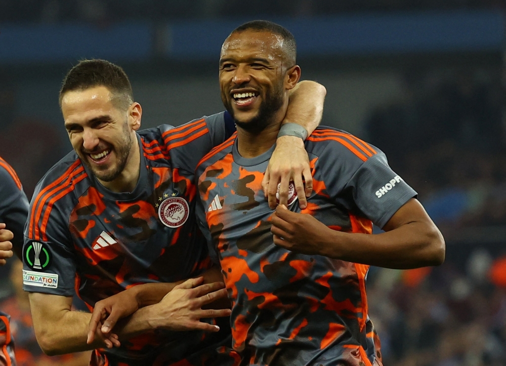 Olympiakos' Moroccan striker #09 Ayoub el-Kaabi celebrates after scoring the opening goal of the UEFA Europa Conference League semi final 