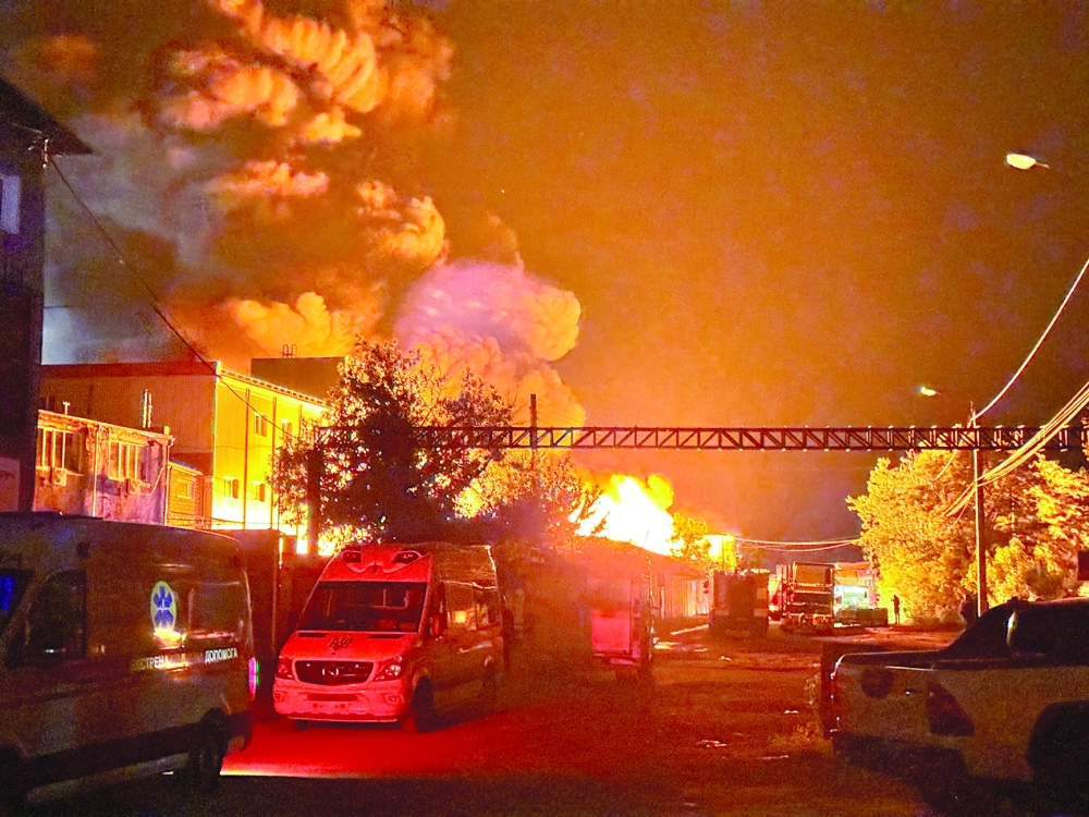 Firefighters work at a site of a Russian drone strike, amid Russia's attack on Ukraine, in Kharkiv. — Reuters 