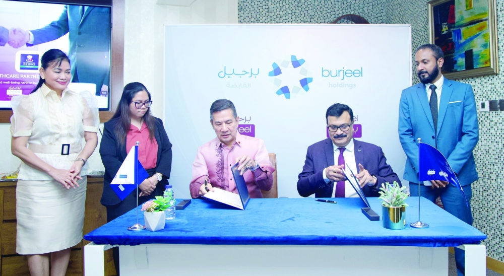 Raul S Hernandez, Philippines Ambassador to Oman, and Dr (Major) Pankaj Chawla, Regional Director of Burjeel Holdings Oman, sign the MoU.