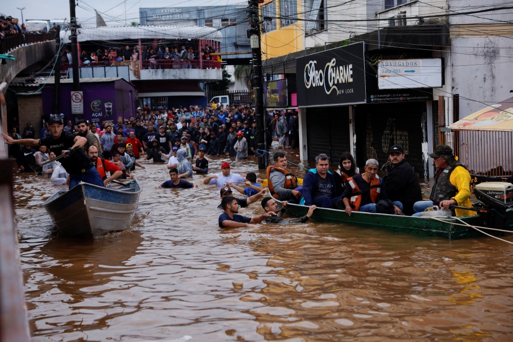 People are rescued after floods in Canoas, at the Rio Grande do Sul state, Brazil. — Reuters 