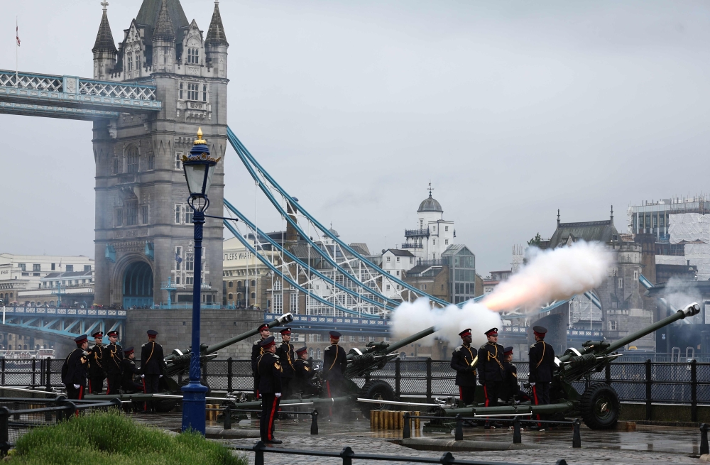 Members of the Honourable Artillery Company fire a 62 Gun Royal Salute, to mark the first Anniversary of the Coronation of Britain's King Charles III, in central London. — AFP 