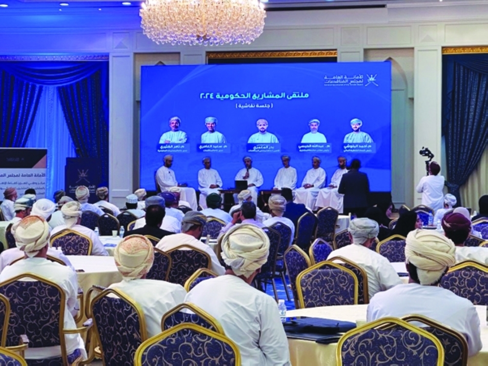 Delegates participating in a panel discussion