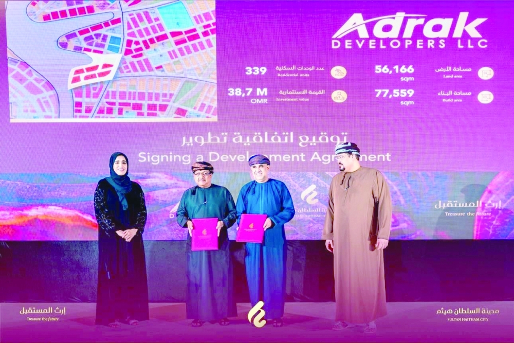 Dr Khalfan bin Said al Shueili, Minister of Housing and Urban Planning, with Dr Thomas Alexander, Chairman of Al Adrak Group of Companies, at the agreement signing ceremony.