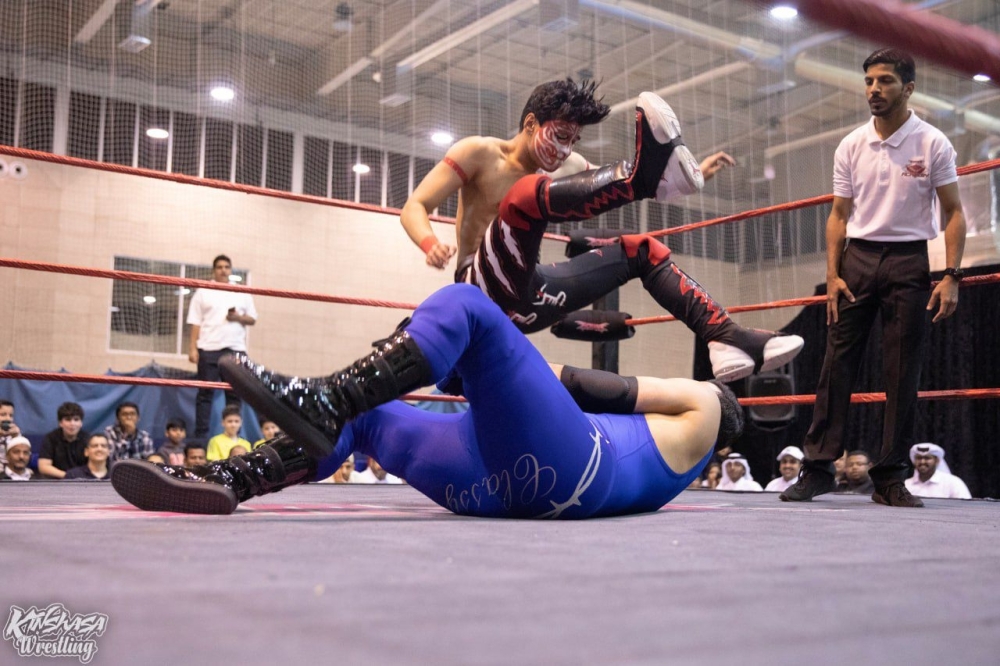 Anas al Riyami (top) during an event in Qatar.