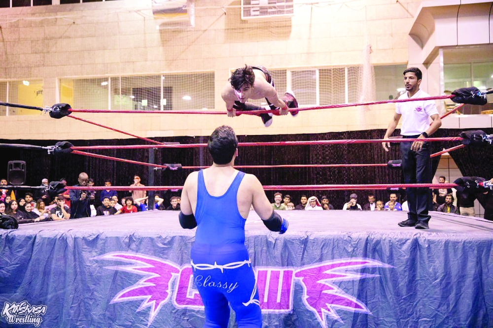 Anas al Riyami (top) during an event in Qatar.