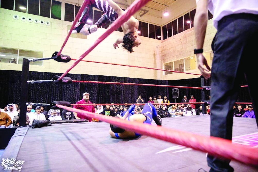 Anas al Riyami (top) during an event in Qatar.