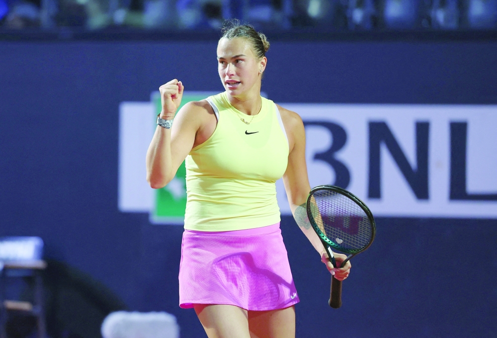 Poland's Iga Swiatek returns to USA's Coco Gauff during the Women's WTA Rome Open tennis tournament at Foro Italico in Rome