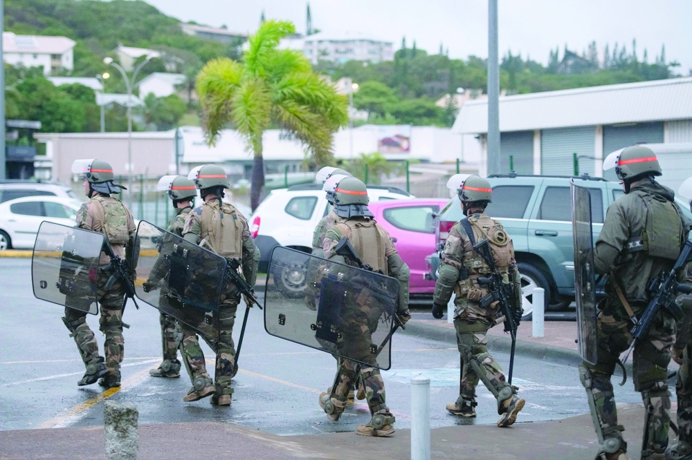(Security Reinforced) French soldiers secure the Magenta airport in Noumea, New Caledonia. 