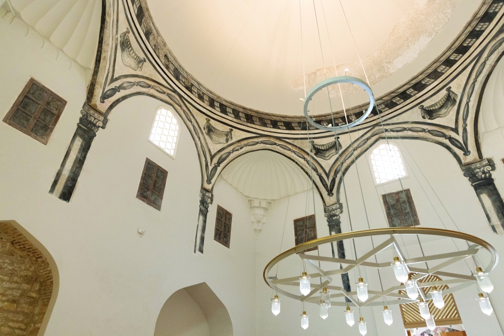 A cold room at the Zeyrek Cinili Hamam in Istanbul, where visitors can enjoy a Turkish bath under domes pierced with star-shaped skylights, on April 24, 2024. (Bradley Secker/The New York Times)