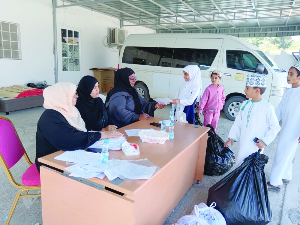 Students gather plastic bottle caps to protect environment and buy medical devices for the elderly in Nizwa