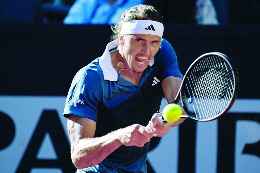 Zverev hits the ball in the semi final.— AFP


