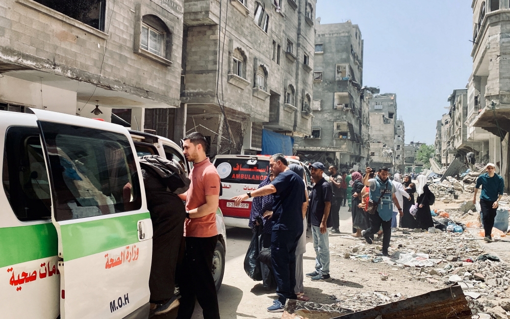 Palestinians evacuate Kamal Adwan hospital following an Israeli strike, in the northern Gaza Strip. — Reuters 