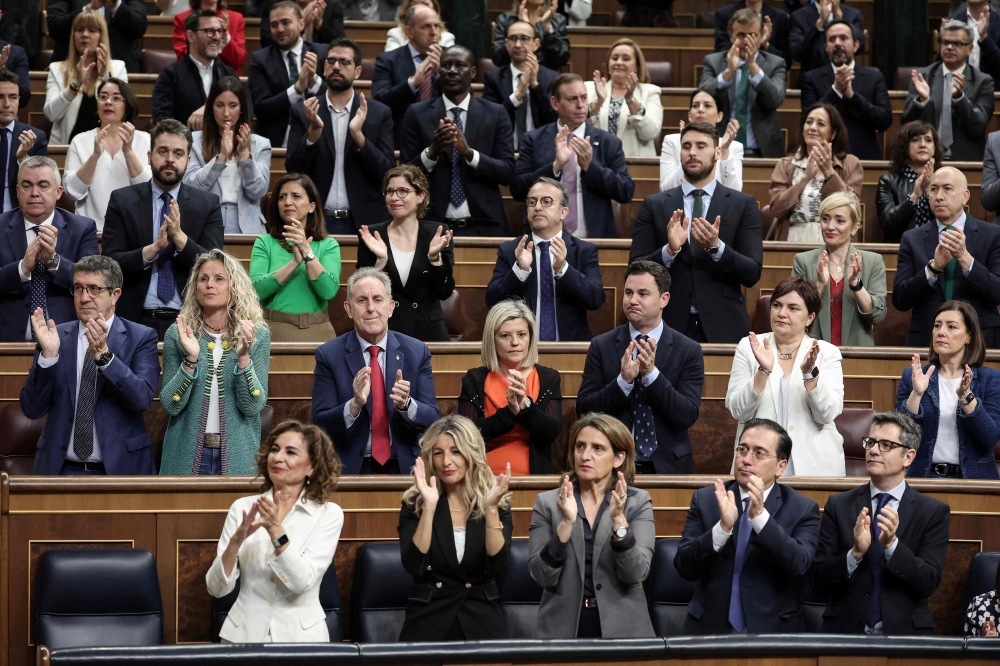 Members of the Government and MPs applaud as Spain's Prime Minister delivers a speech to announce that Spain will recognize Palestine as a state on May 28