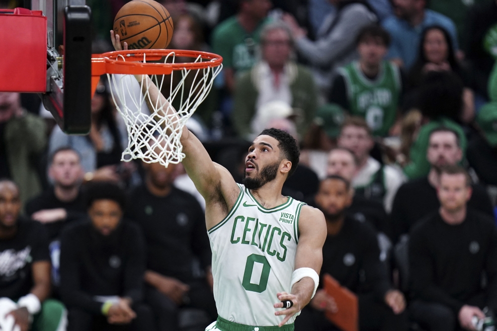 May 21, 2024; Boston, Massachusetts, USA; Boston Celtics forward Jayson Tatum (0) shoots the ball against the Indiana Pacers in the first half for game one of the eastern conference finals for the 2024 NBA playoffs at TD Garden. Mandatory Credit: David Butler II-USA TODAY Sports
