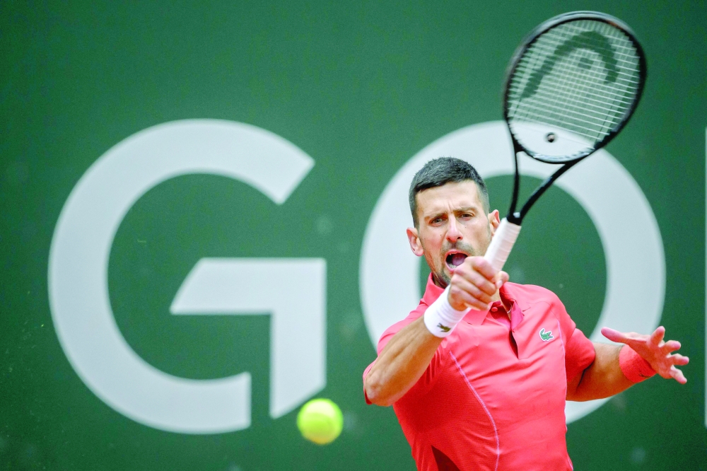 Serbia's Novak Djokovic returns the ball to Germany's Yannick Hanfmann during their ATP 250 Geneva Open tennis tournament single match 