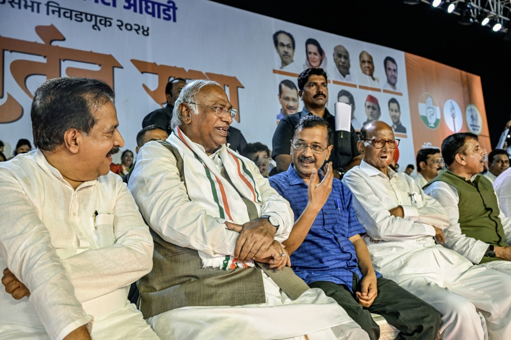 Mallikarjun Kharge, second from left, president of Indian National Congress, India’s main opposition party; Arvind Kejriwal, hand raised, leader of the Aam Aadmi Party;y and Sharad Pawar, fourth from left, leader of the Nationalist Congress Party, during a political rally in Mumbai, India, May 17, 2024.