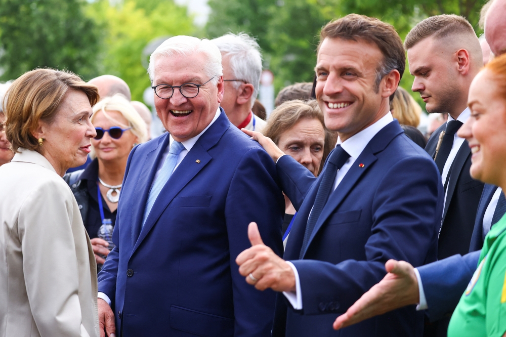 German President Frank-Walter Steinmeier and French President Emmanuel Macron visit Democracy Festival, in Berlin. — Reuters 