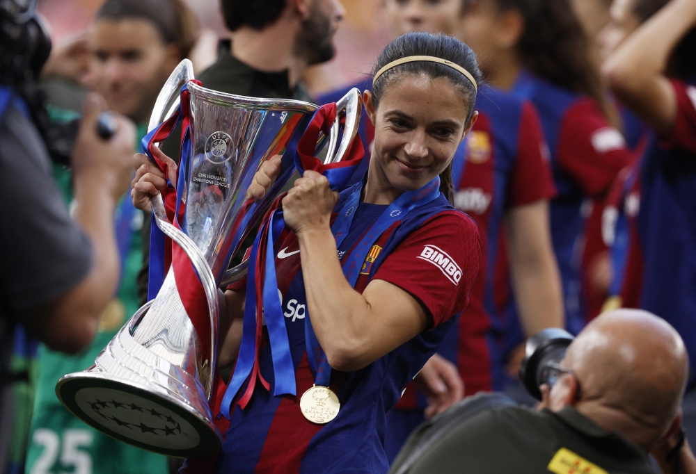 Soccer Football - Women's Champions League - Final - FC Barcelona v Olympique Lyonnais - San Mames, Bilbao, Spain - May 25, 2024 FC Barcelona's Aitana Bonmati celebrates with the trophy after winning the Champions League REUTERS/Albert Gea
