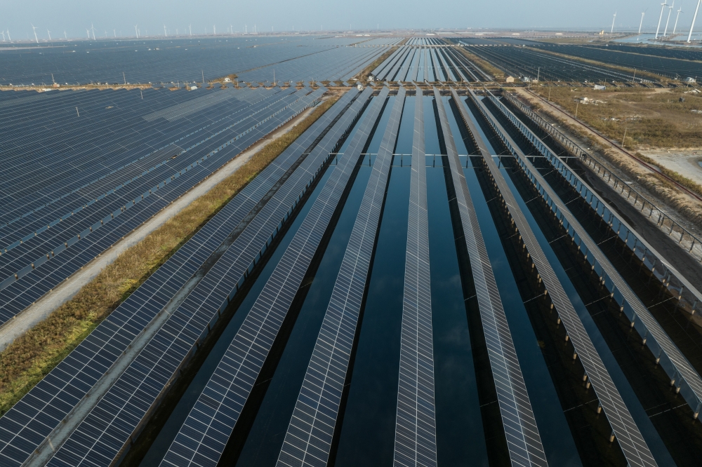 A solar and wind farm in Weifang, China, a country that controls over 80 per cent of worldwide production of every step of solar panel manufacturing. — The New York Times