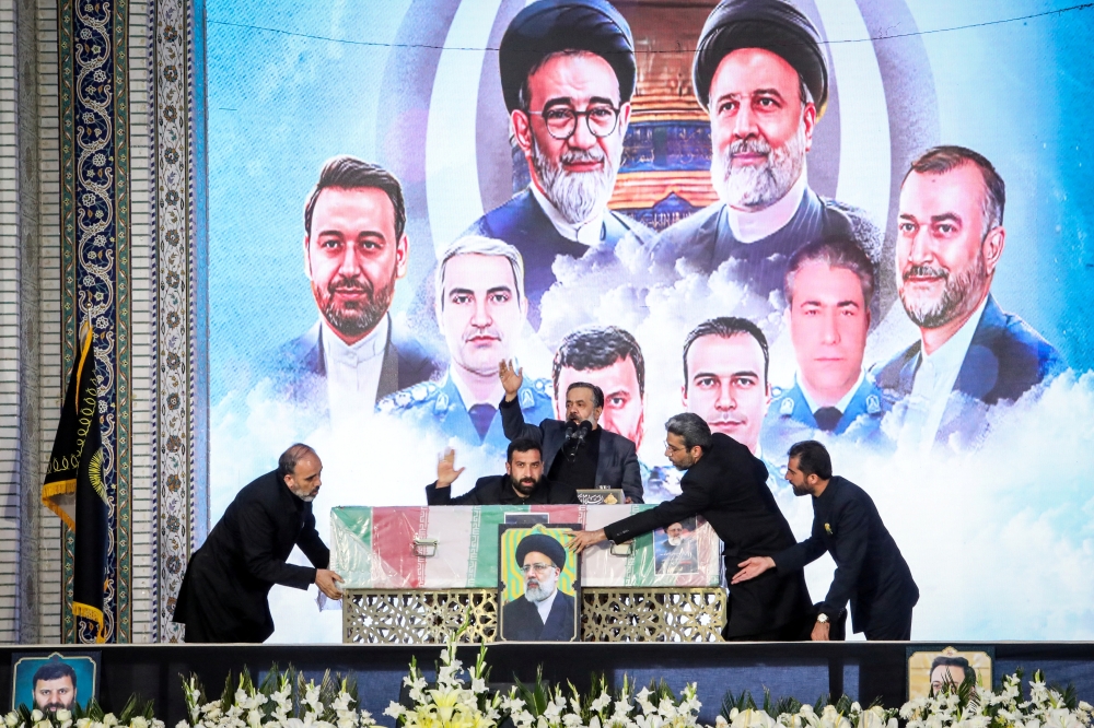 The coffin of late Iranian President Ebrahim Raisi during burial ceremony in the holy shrine of Imam Reza in Mashha. — Reuters file photo 