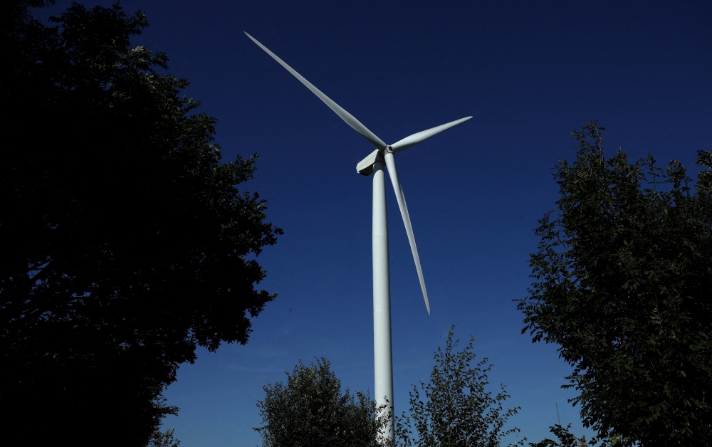 A wind turbine is seen on the Frodsham on shore wind farm in Frodsham, Britain. — Reuters