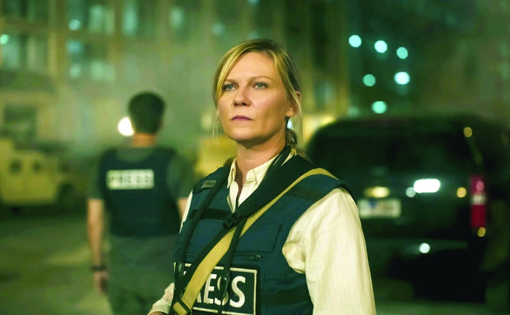 Kirsten Dunst plays a war photographer in Alex Garland’s “Civil War.” 