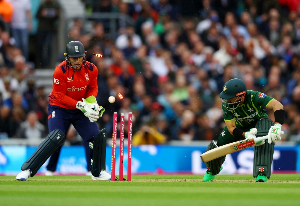 Fourth T20 International - England v Pakistan - The Oval, London, Britain - May 30, 2024 England's Adil Rashid bowls out Pakistan's Mohammad Rizwan Action.