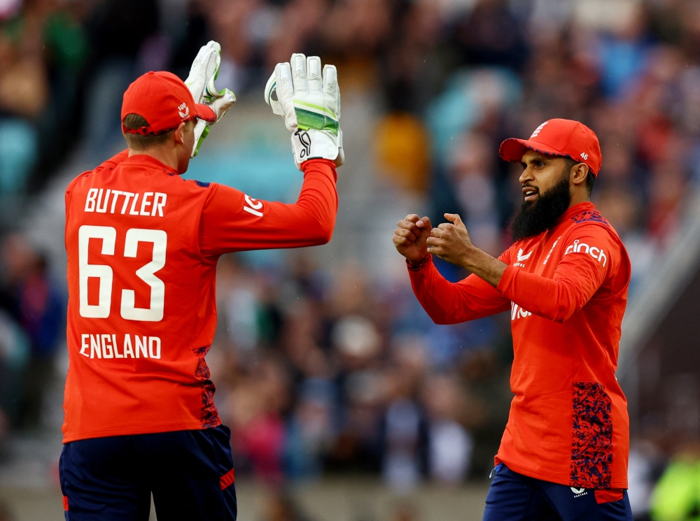 Fourth T20 International - England v Pakistan - The Oval, London, Britain - May 30, 2024 England's Adil Rashid bowls out Pakistan's Mohammad Rizwan Action.