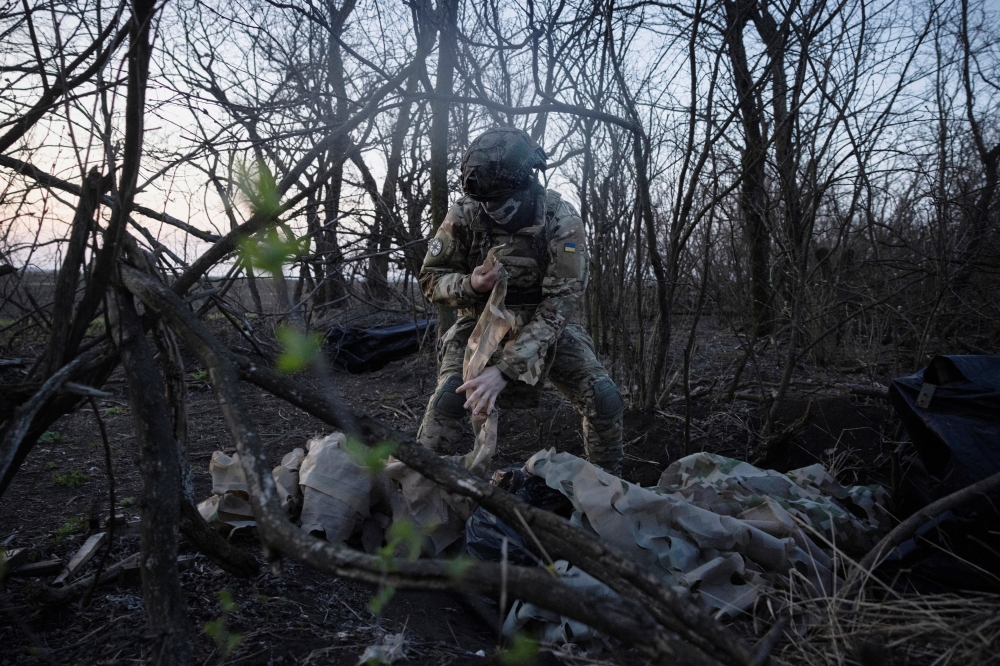 A member of a drone unit of Ukraine's 58th Motorized Brigade unpacks equipment near the front line in the Donetsk region, Ukraine. — Reuters file photo 