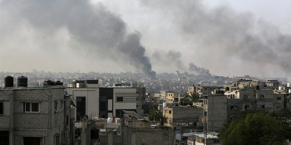 Smoke rises following Israeli strikes during an Israeli military operation, in Rafah