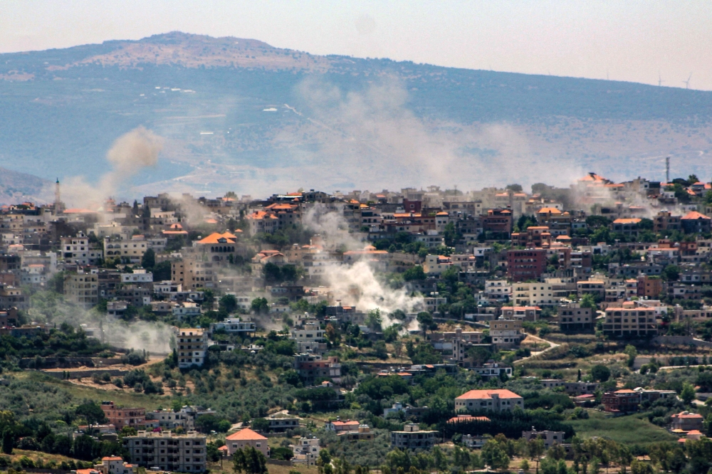 Smoke billows during an Israeli strike on the southern Lebanese border village of Khiam. — AFP 