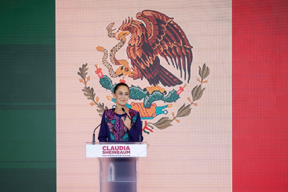 Mexico's presidential candidate for Morena party Claudia Sheinbaum talks to supporters following the results of the general election in Mexico City. — AFP 