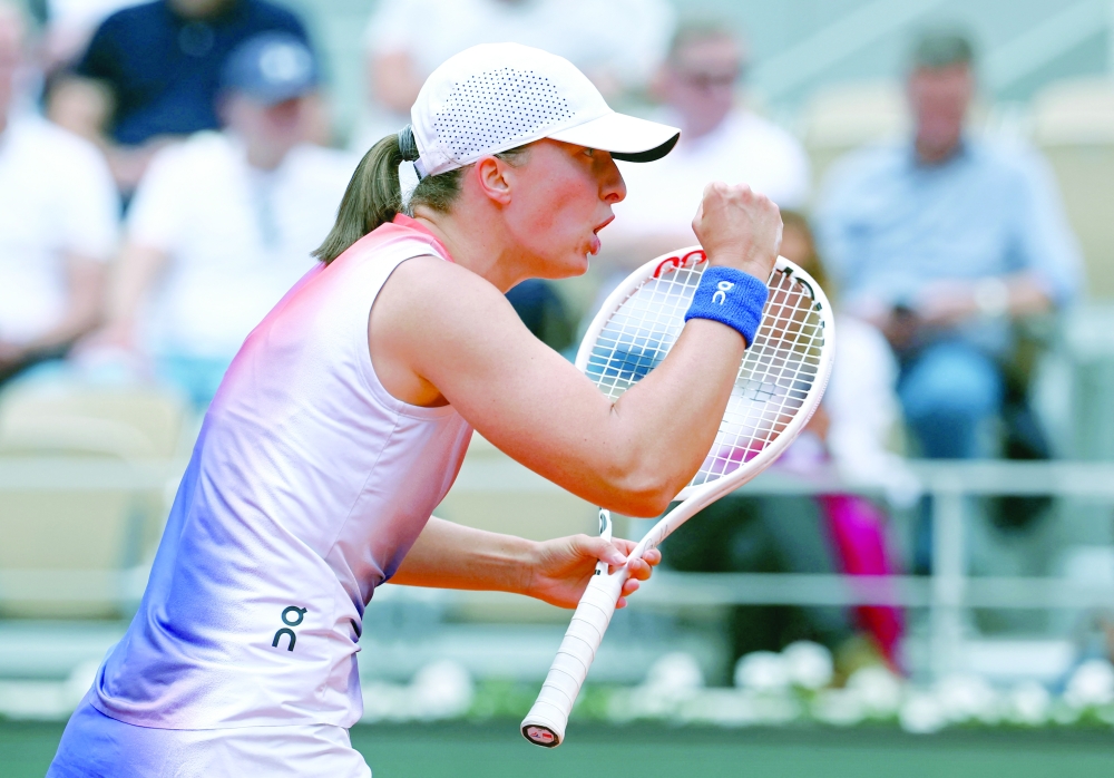 Poland's Iga Swiatek reacts during her quarterfinal match against Czech Republic's Marketa Vondrousova 