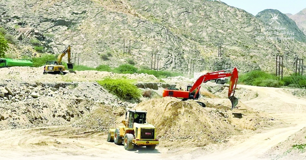 Construction under way on Wadi Adai dam.