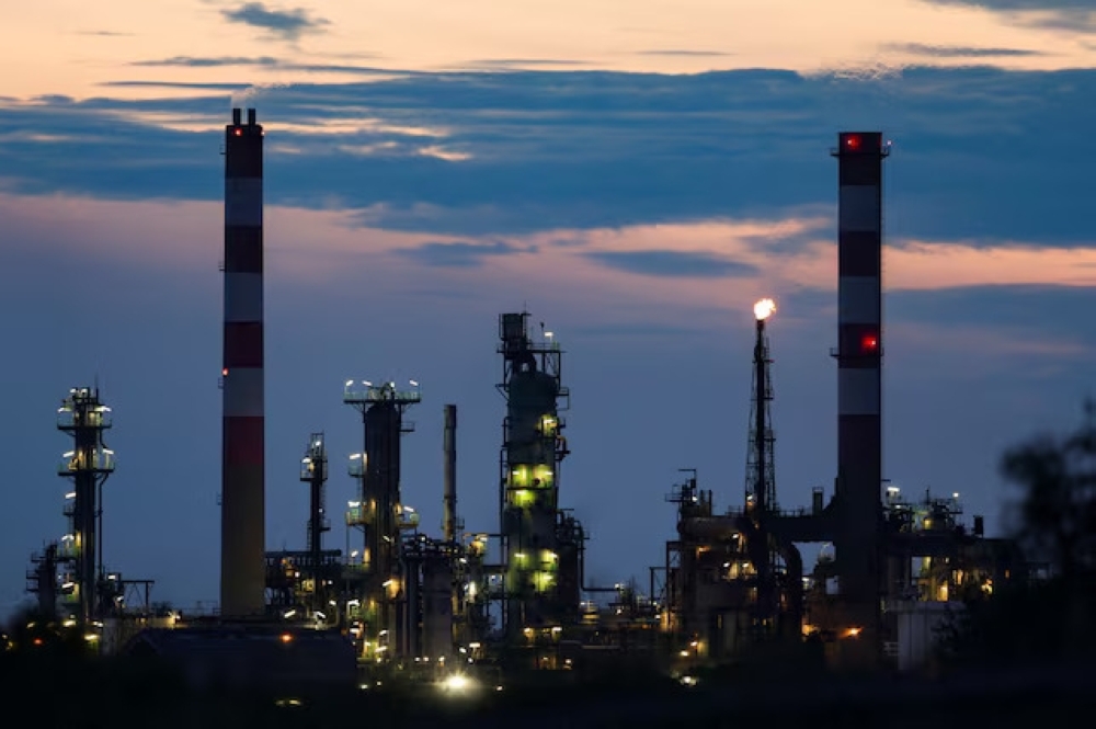 A general view of a French oil Esso refinery by night in Fos-sur-Mer, France-REUTERS