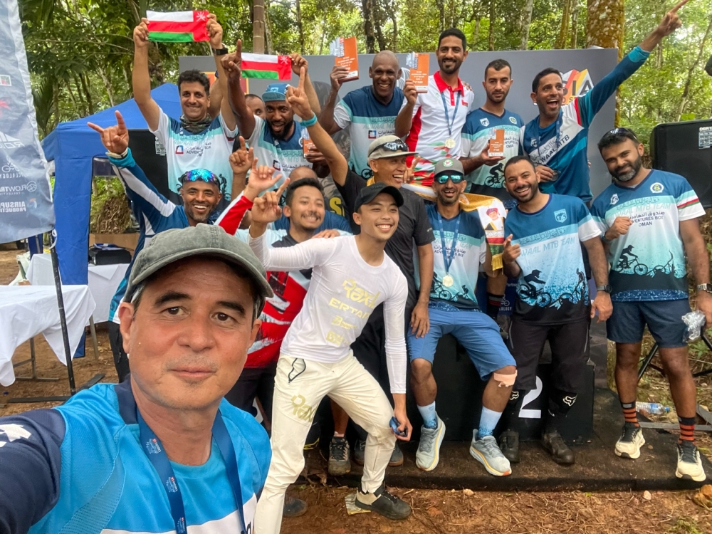 With the Oman racing team
