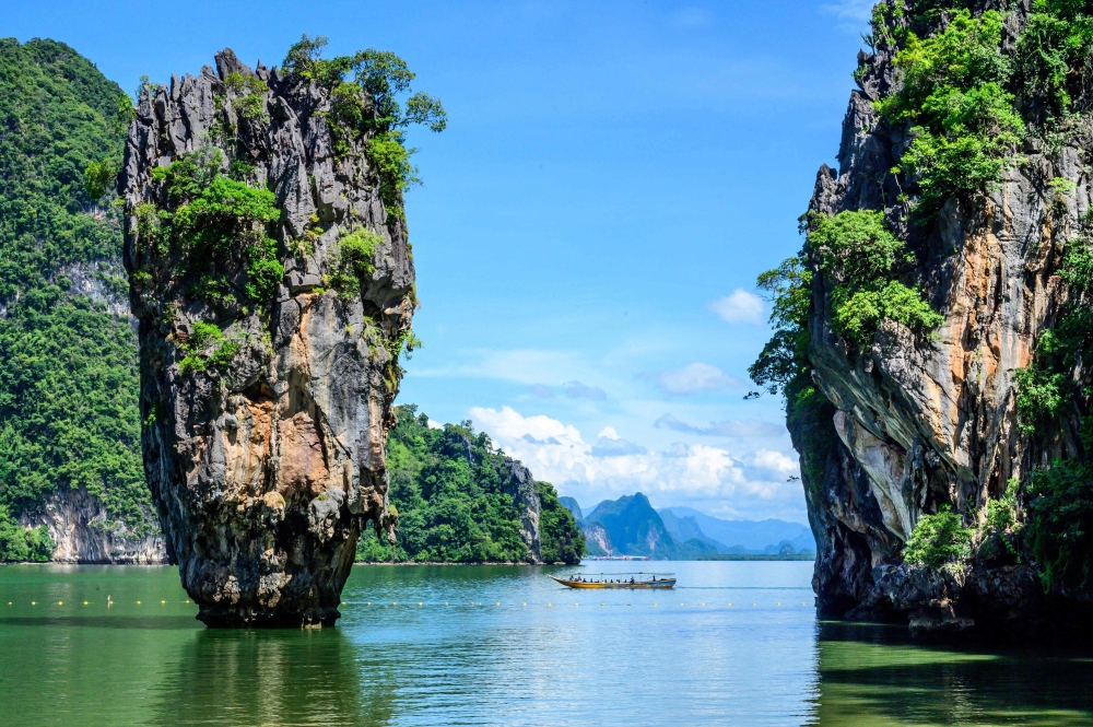 A longtail boat near James Bond Island in Phang Nga Bay northeast of Phuket. - AFP File
