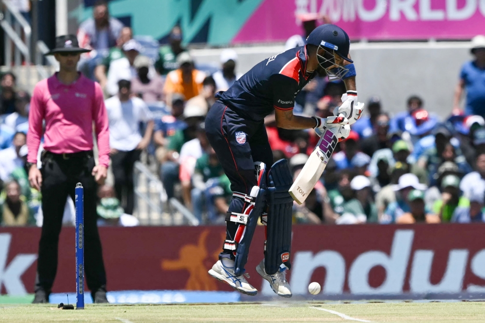 USA's captain Monank Patel plays a shot during the ICC men's Twenty20 World Cup 2024 group A cricket match between the USA and Pakistan at the Grand Prairie Cricket Stadium in Grand Prairie
