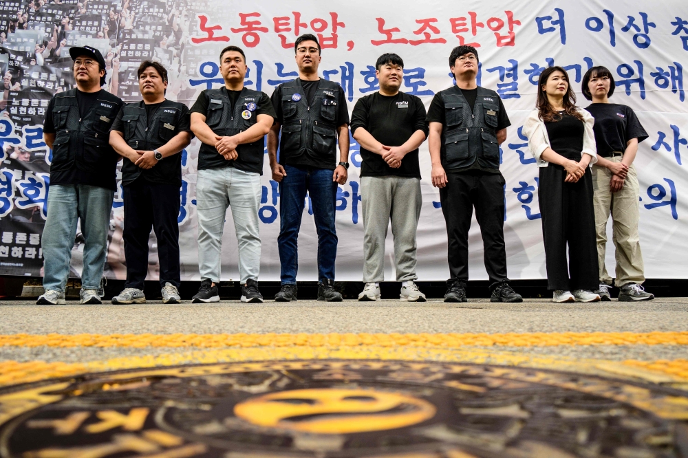 Samsung Electronics' union members hold a rally outside the company building in Seoul 
