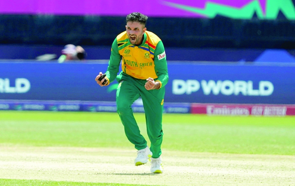 South Africa's Keshav Maharaj reacts after dismissing Bangladesh's Tanzim Hasan Sakib during the ICC men's Twenty20 World Cup 2024 group D cricket match between South Africa and Bangladesh at Nassau County International Cricket Stadium in East Meadow, New York on June 10, 2024.