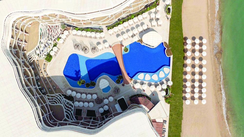 The resort is positioned on the tranquil shores of the Al Mouj waterfront .